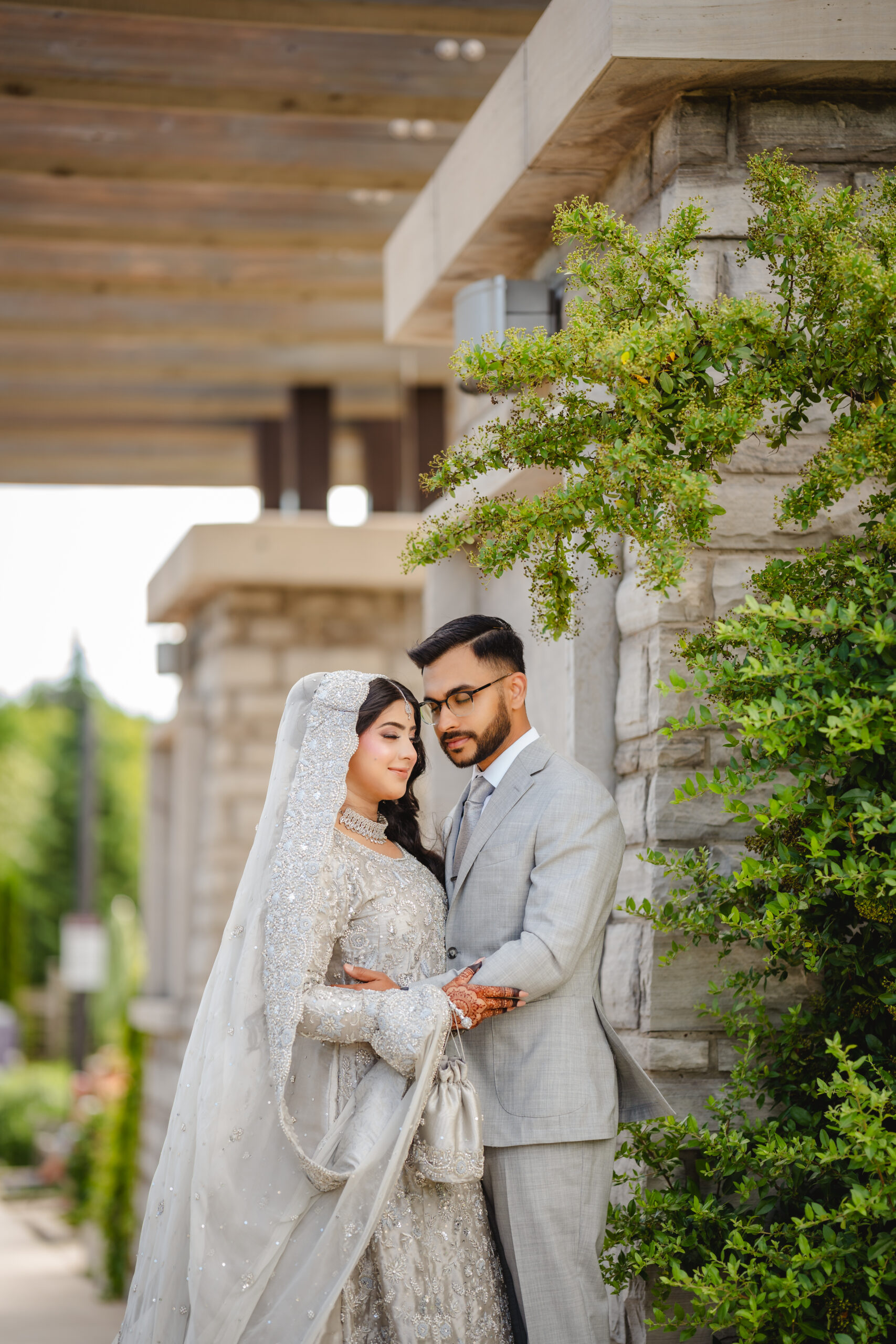 Pakistani bride and groom pose for a reception-at riverwood conservancy
